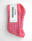 Hayes socks from Hooray Sock Co. Mid-crew length, textured ribbing, solid heel, toe, and contrasting color. In Mustard Yellow, Blue, Pink.