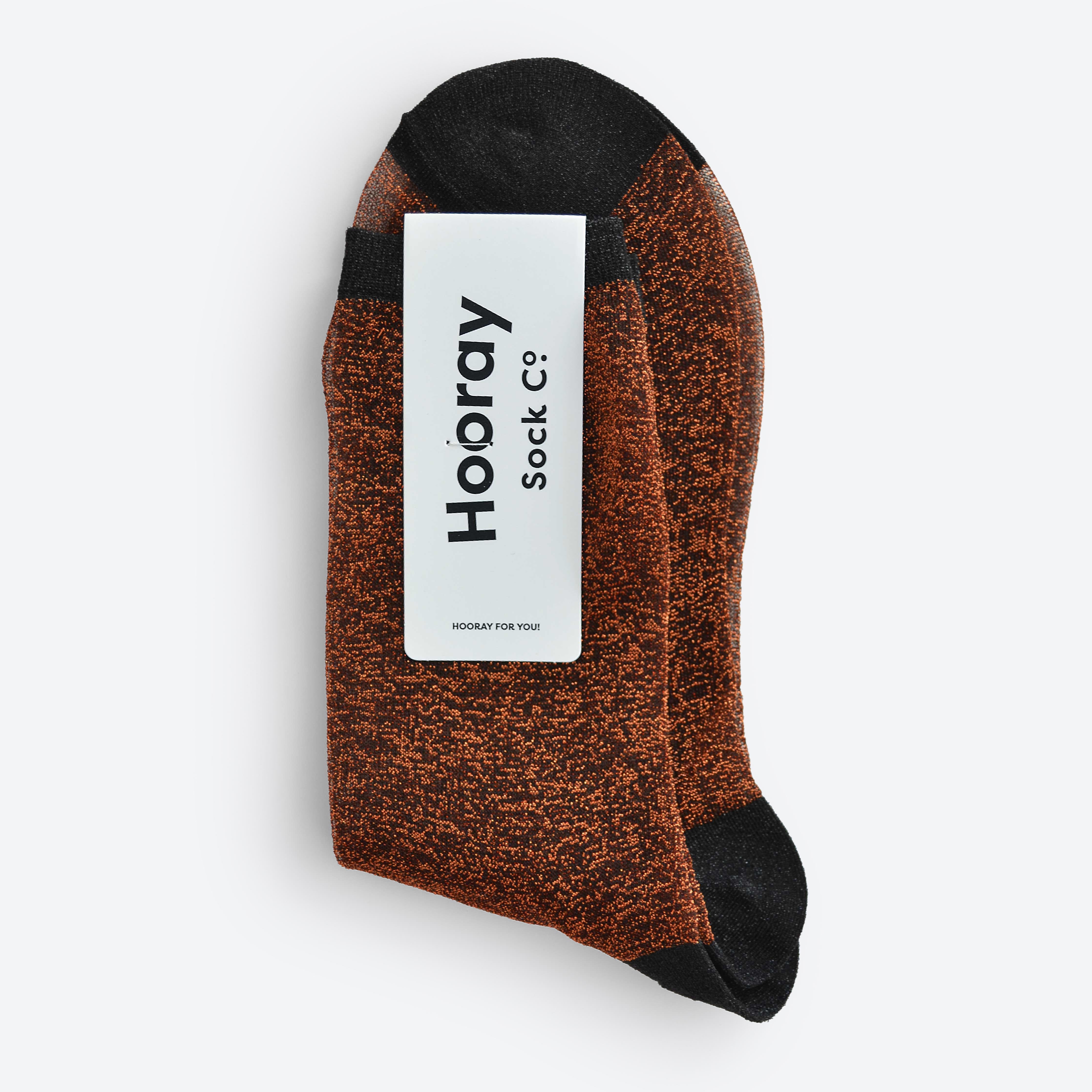 Elevate your style with Broadway socks in Black, Silver, Brick, or Blue. Short crew length with subtle metallic thread. Made in South Korea.