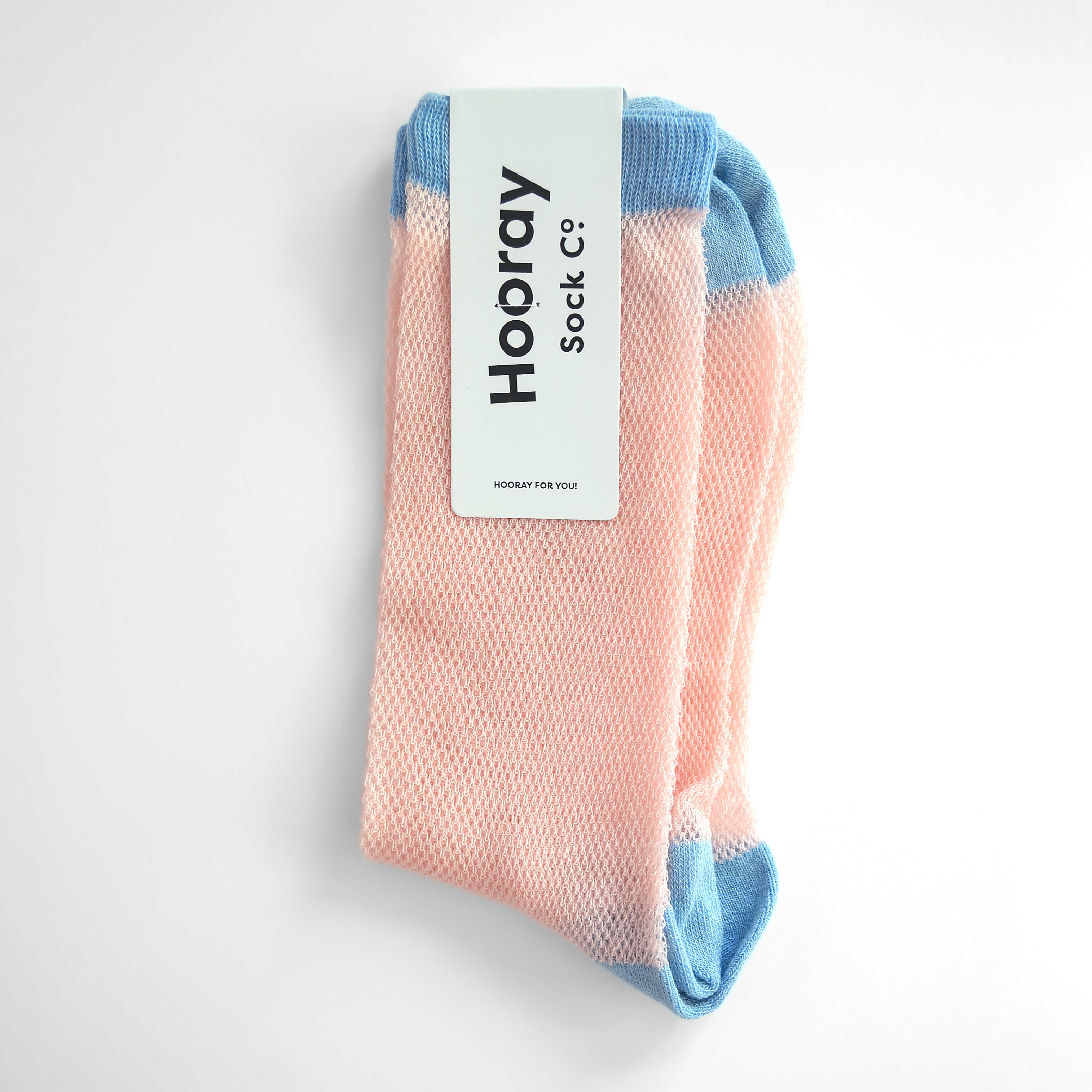 'Valencia' mid-crew socks, showcasing an open mesh sheer design in Cantaloupe, Pink, and Purple, effortlessly blending breathability and chic style. Size: Small (US women’s shoe size: 4-8).