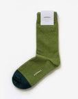 Lafayette moss green cotton crew sock with Hooray label tag – showcasing the two-tone design and craftsmanship.