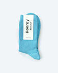 Hooray Sock Co.'s Sky Crew Socks: Everyday comfort in Sky Blue. Unisex design, shorter crew length. 80% cotton, 20% spandex. Made in South Korea. Size: Small (Women's 4-10).