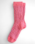 Hayes socks from Hooray Sock Co. Mid-crew length, textured ribbing, solid heel, toe, and contrasting color. In Mustard Yellow, Blue, Pink.