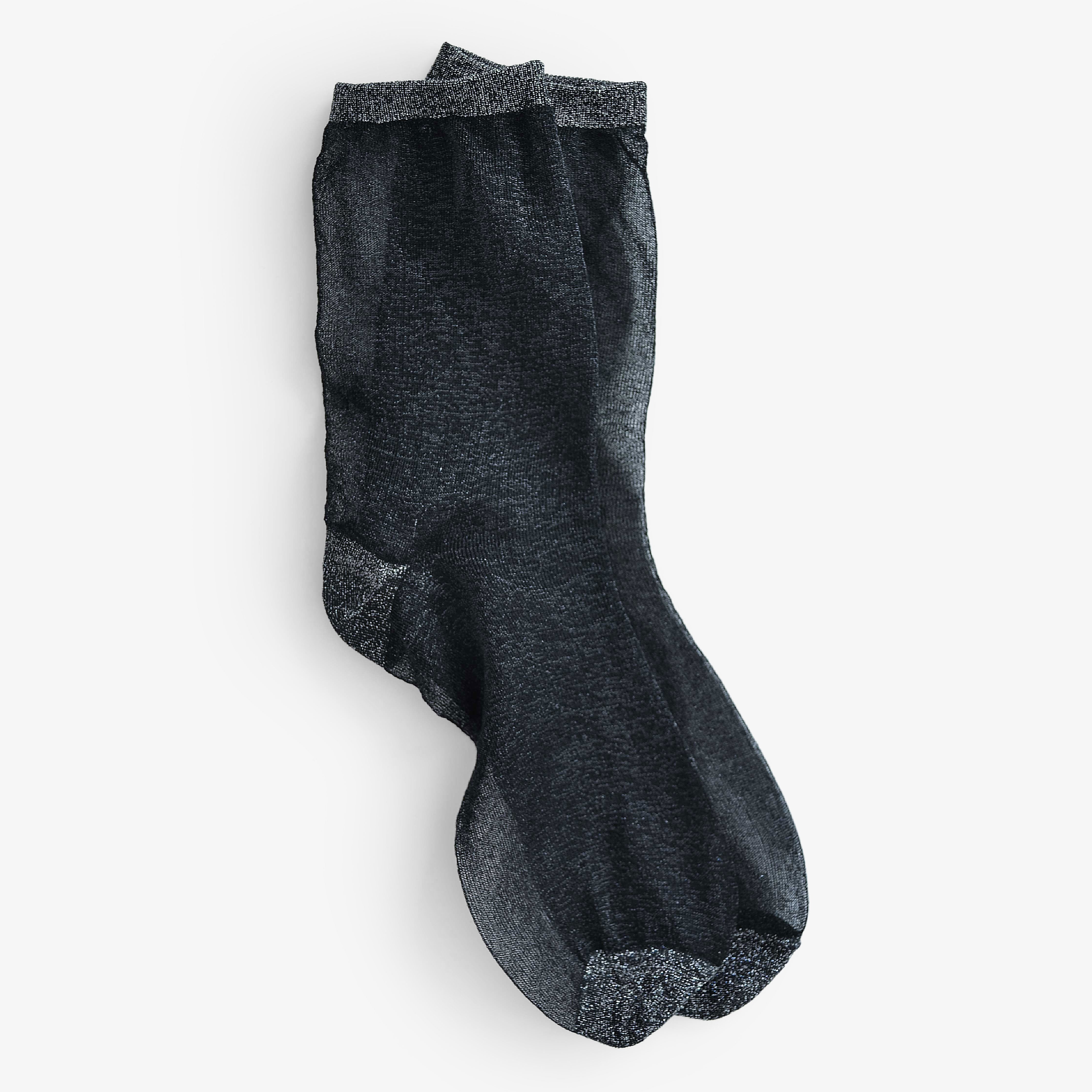 Elevate your style with Broadway socks in Black, Silver, Brick, or Blue. Short crew length with subtle metallic thread. Made in South Korea.