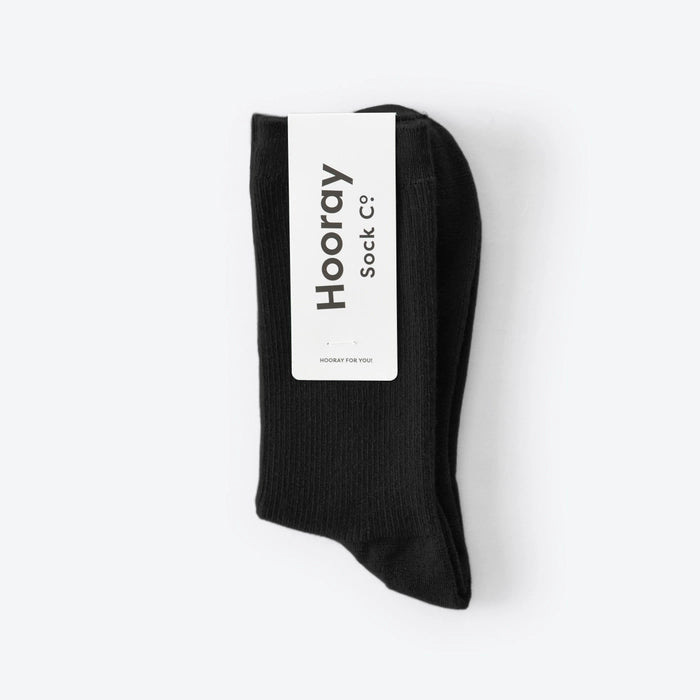 Hooray Sock Co. Raven Merino Wool Crew Socks. Everyday ease and flair in dark black. Crew length, 20% Merino Wool, 35% Spandex, 45% Acrylic. Size: Small (US women’s 4-10)