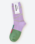 Hooray Sock Co.'s Hyde Crew Socks: Style soaring with vibrant purple and green pop. Luxe comfort, crew length. 80% cotton, 20% spandex. Made in South Korea. Unisex. Small (Women's 4-10).