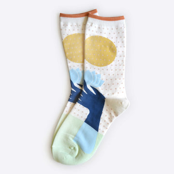 Hooray Sock Co. Lotus Crew Socks. Fun, lightweight, cozy with blue and gold lotus illustration. Crew length, 80% cotton, 20% spandex.