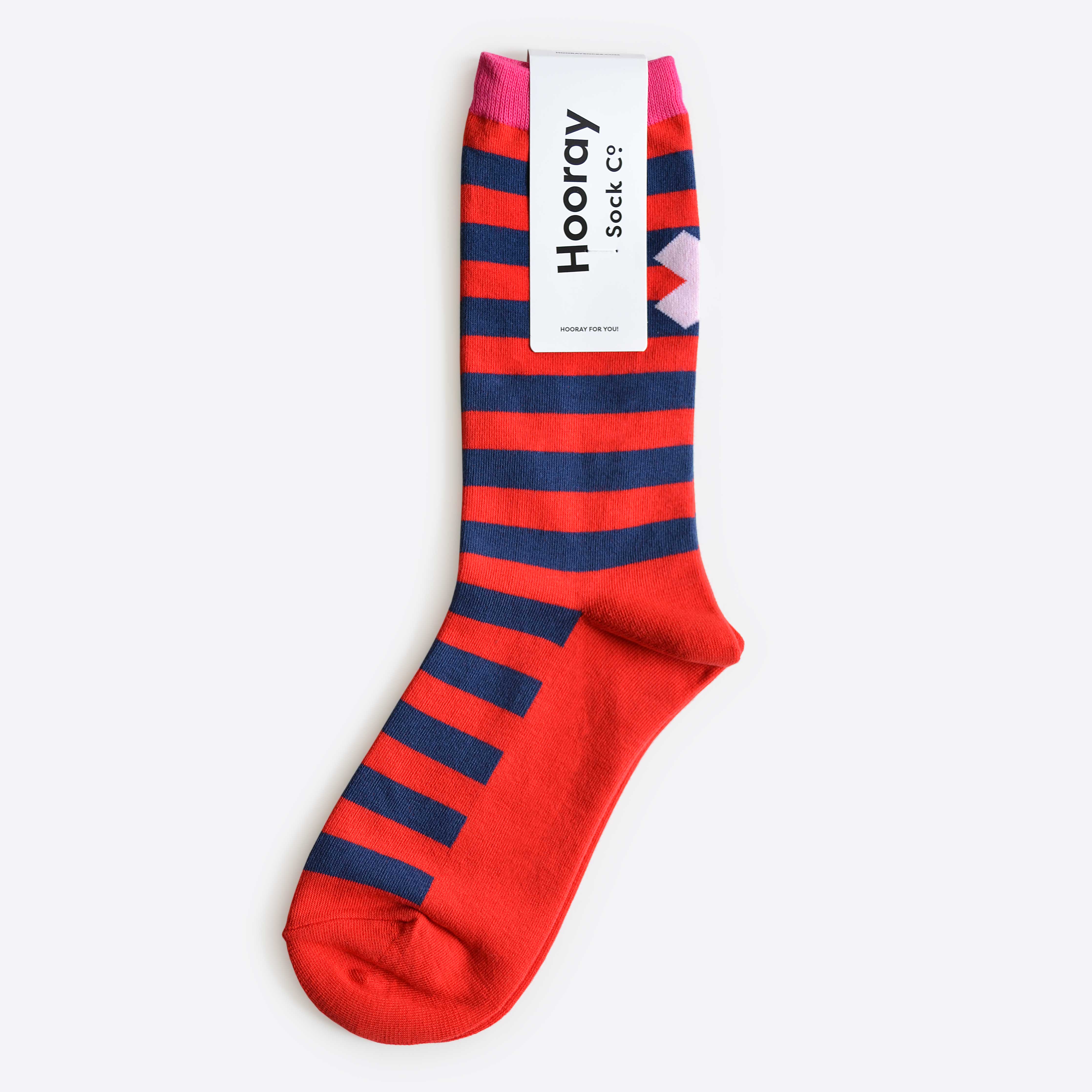 Hooray Sock Co. Taylor Red and Blue Stripe Crew Socks. Bold graphic 'X' on back. Crew length, 80% cotton, 20% spandex. Sizes: Large (US men’s 8-12), Small (US women's 4-10). 