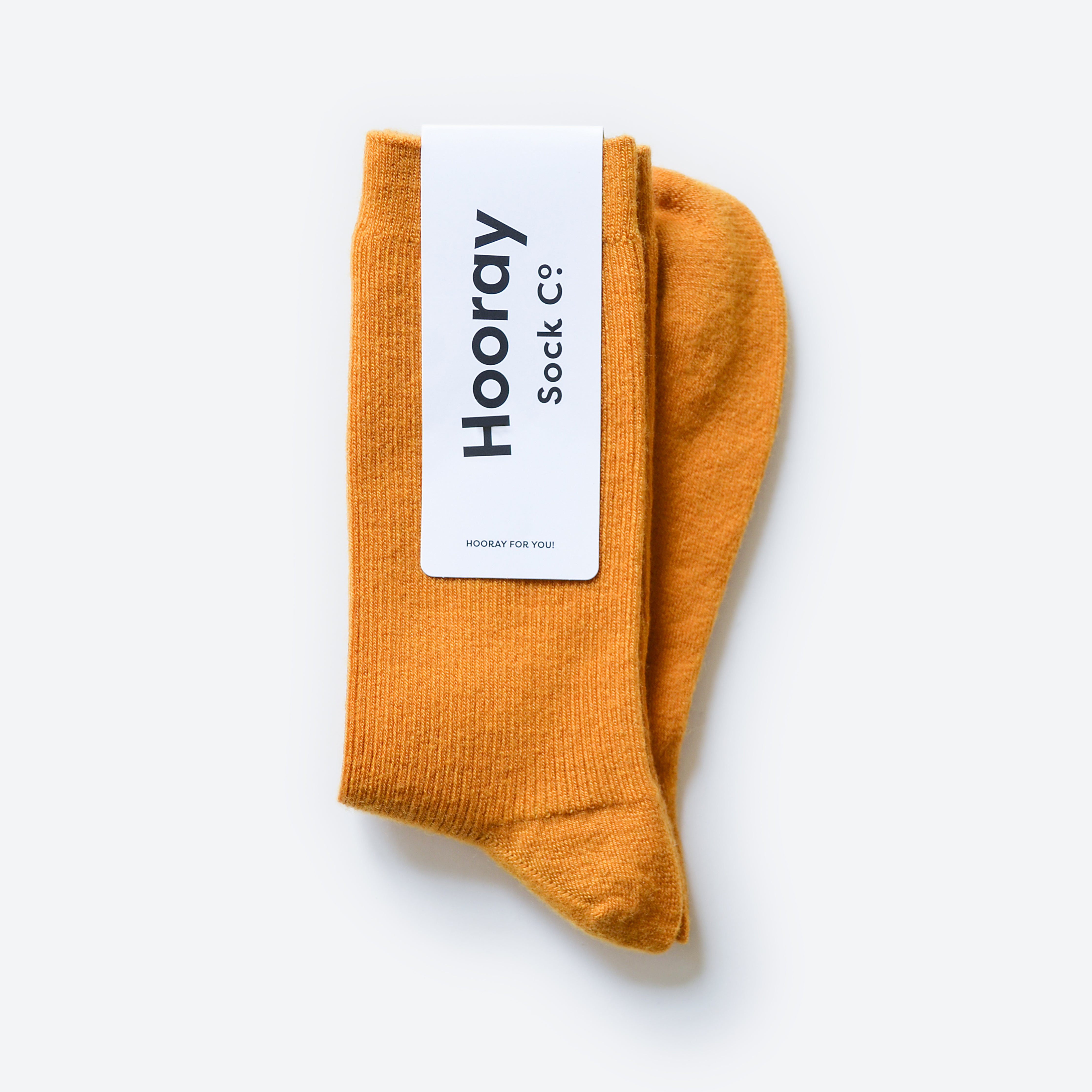 Hooray Sock Co. Gold-Hued Merino Wool Crew Socks. Cozy comfort meets fancy style. Short crew in gold hues. 20% Merino Wool.