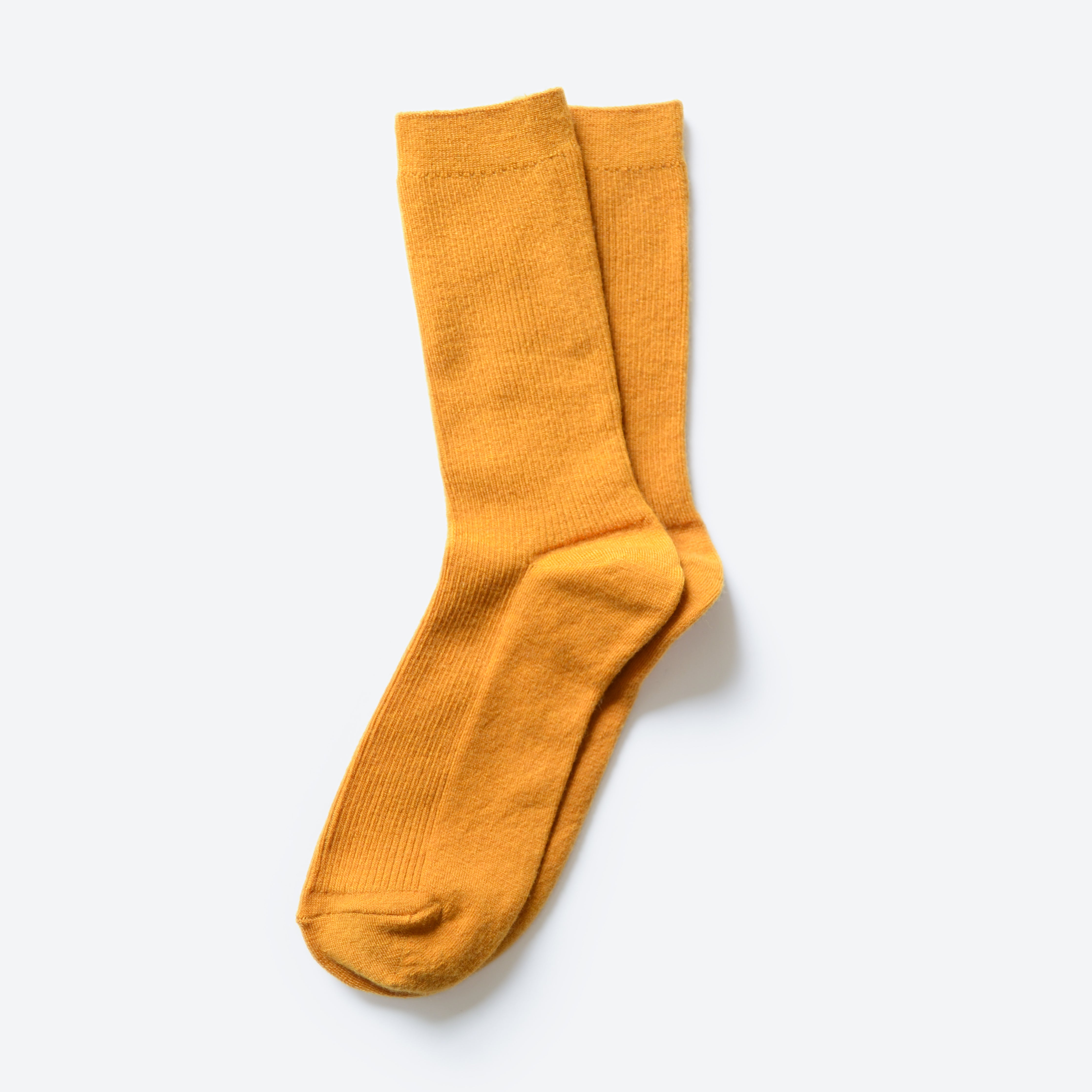 Hooray Sock Co. Gold-Hued Merino Wool Crew Socks. Cozy comfort meets fancy style. Short crew in gold hues. 20% Merino Wool.