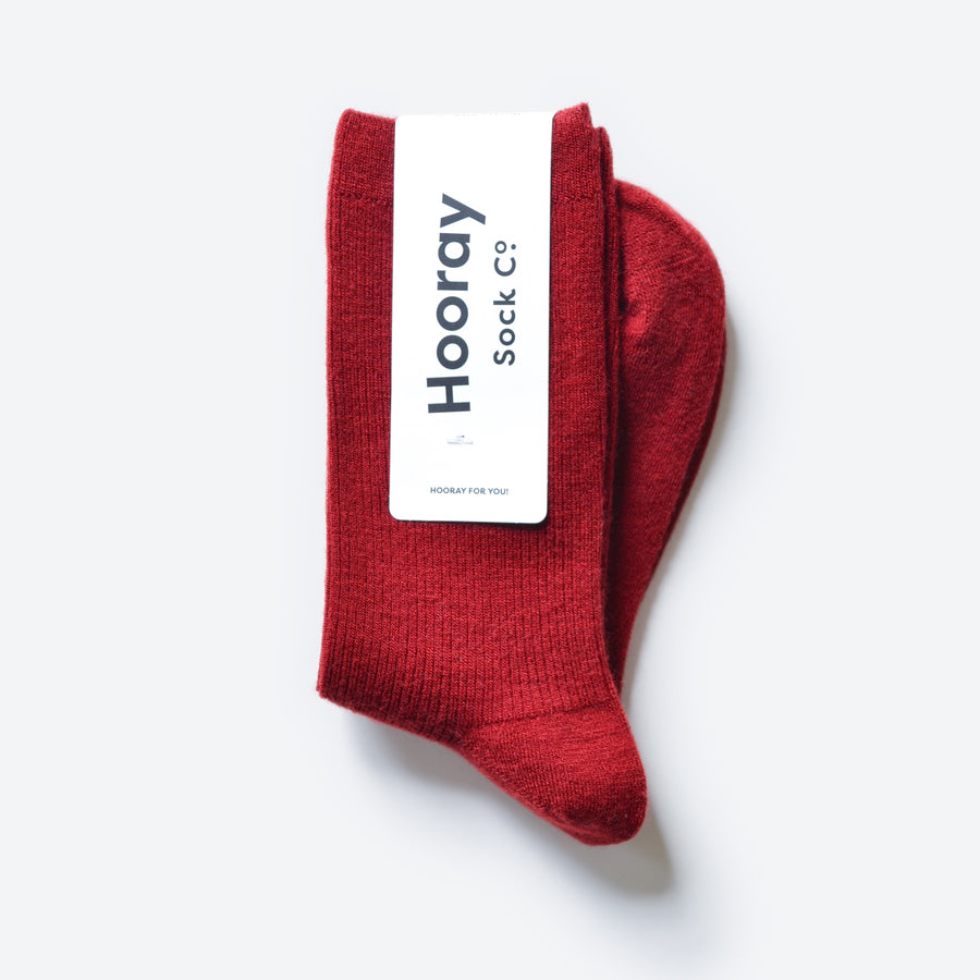 Hooray Sock Co. Monterey Merino Wool Crew Socks. Cozy elegance for any adventure. Short crew in rich red hue. 20% Merino Wool.