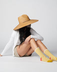 Hooray Sock Co.'s Eureka Crew Socks: Best-selling, Lightweight, Comfy, Golden stripes, Hot red heels. Crew length, 80% cotton, 20% spandex. Made in South Korea. Unisex. 